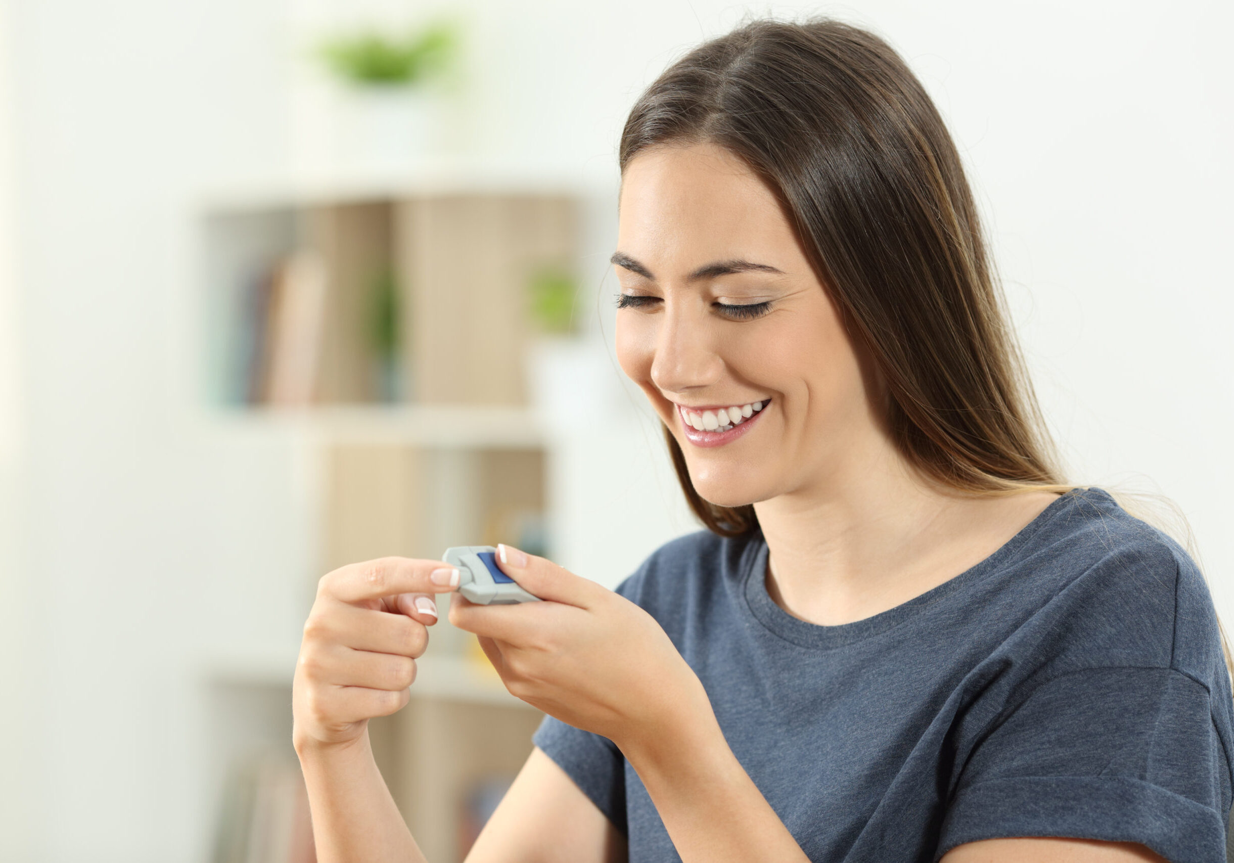 Happy,Diabetic,Girl,Checking,Blood,Sugar,Level,Sitting,On,A